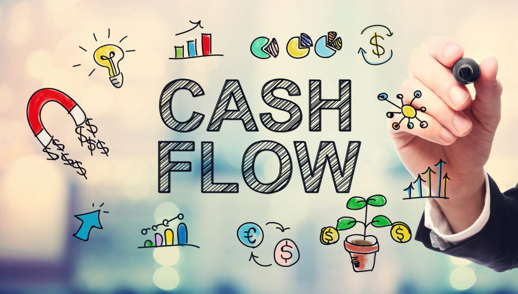 Why cash flow management is important for business success in an economic downturn rather than layoffs.